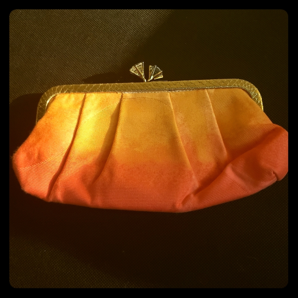 Coach clutch embossed gold and Swarovski closure